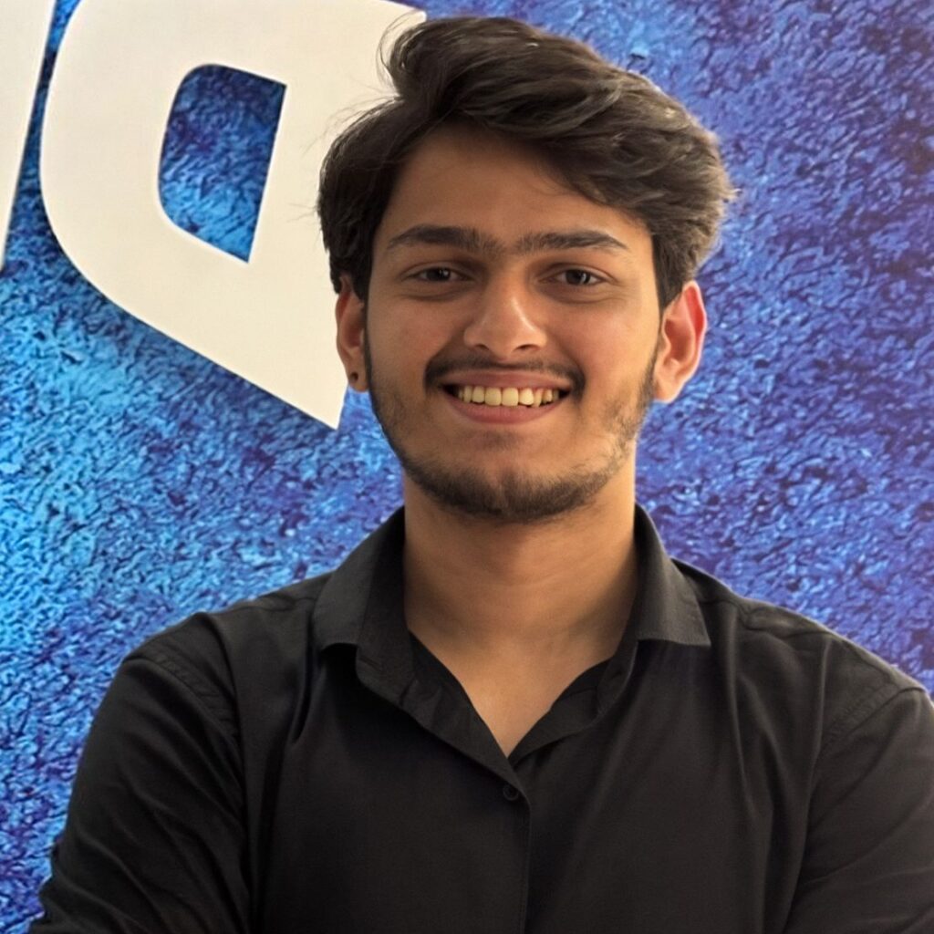 Ayush Kansara, Co-founder of Think Pixel Visuals, at a modern AI production workstation — AI filmmaker and content creator specialising in AI short films, AI teasers, vertical series, and AI ads for brands in India.